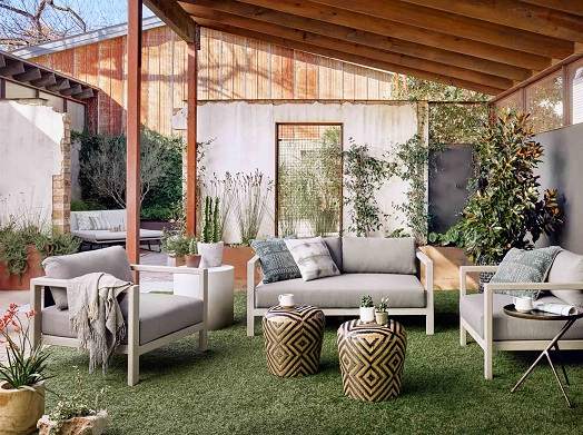 Greenery surrounding outdoor furniture